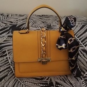 Yellow crossbody by Aldo